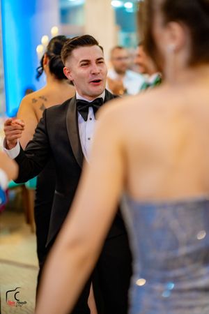 Wedding celebration with dancing guests captured in a sequence of candid moments.