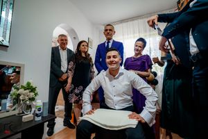 Festive indoor gathering with people enjoying an animated group activity.