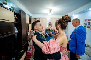 Candid shots of wedding party members interacting and posing in a home setting.