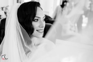 Artistic black and white bridal portraits showcasing elegant veil and makeup details.
