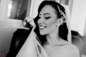 Candid black and white bridal portraits showing genuine emotion and elegant styling.
