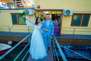 Wedding venue entrance with yellow walls and accessibility ramp for guests.