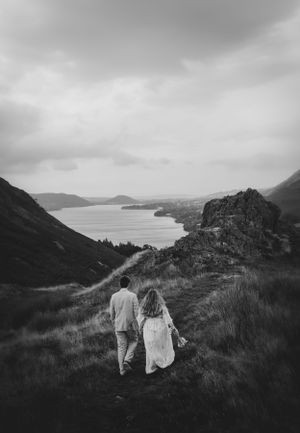 Lake  district Elopement photography couple walking the fell
