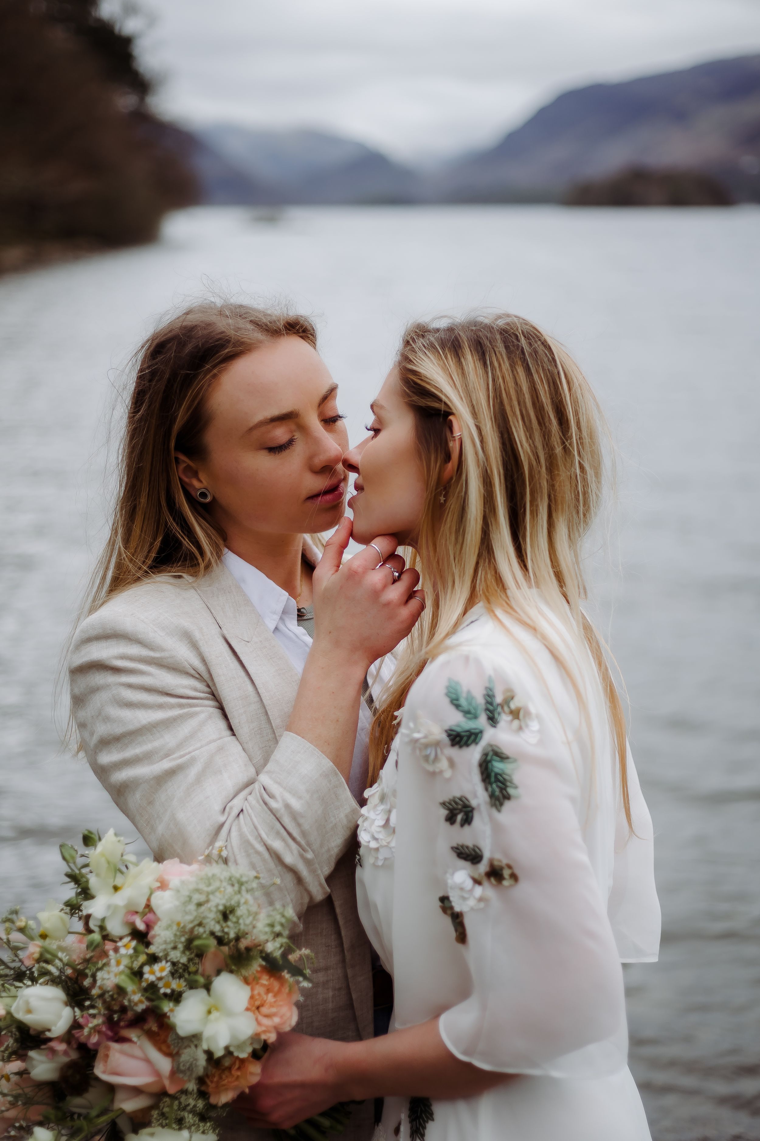 Lake District Elopement photography - brides kissing