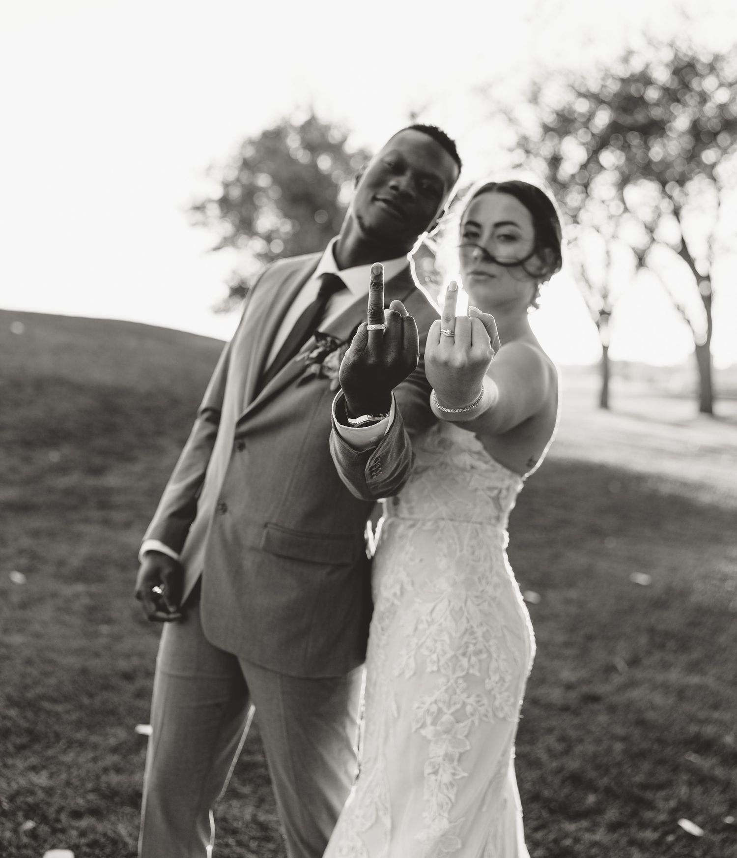 The newlyweds showing off their wedding rings at their Okanagan golf course wedding.