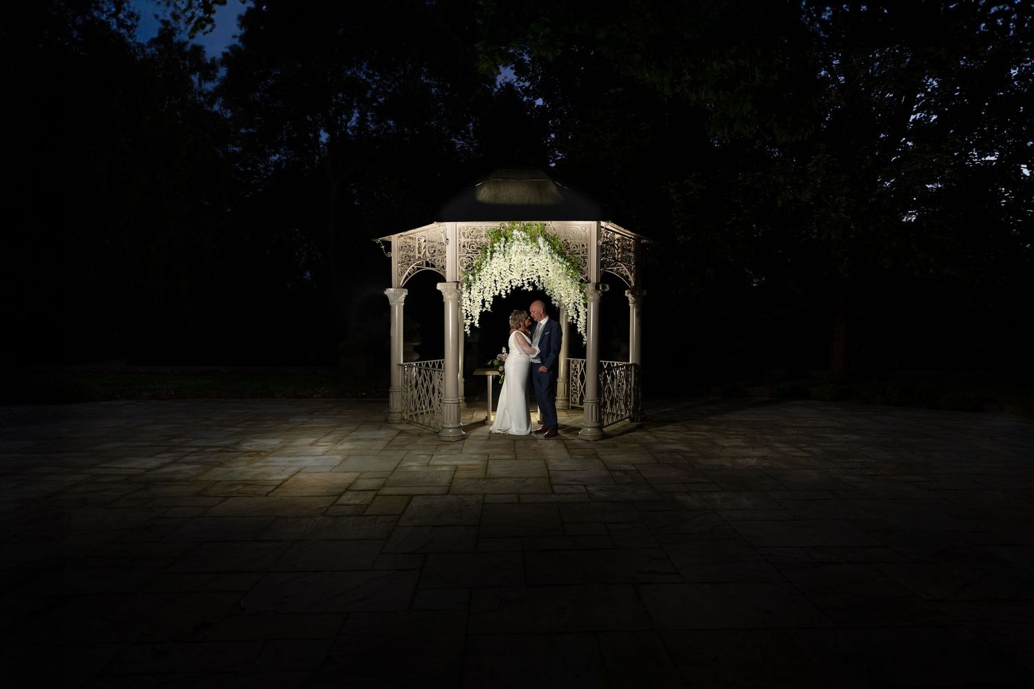 Night portrait of bride and groom near Stroud