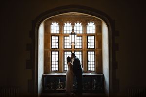 Gothic architecture featuring arched windows and dramatic shadows.