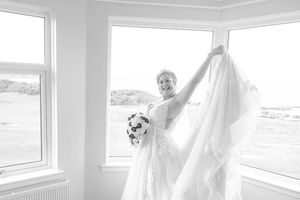 a beautiful bride happy on her wedding day