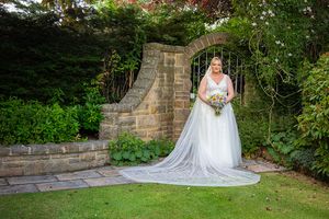 bride by herself at the laich moray gardens