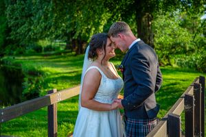 bride and groom at the gardens after they are married