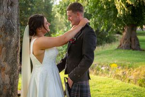 bride and groom at the gardens after they are married