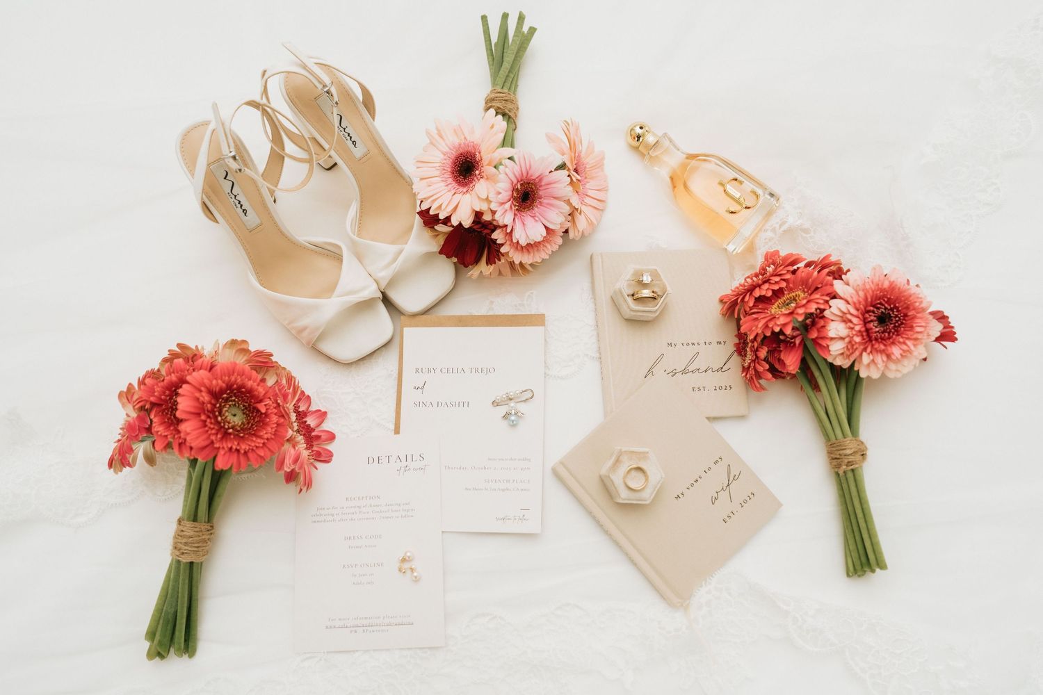 Wedding invitation suite with bouquet, shoes, perfume, rings, and accessories.