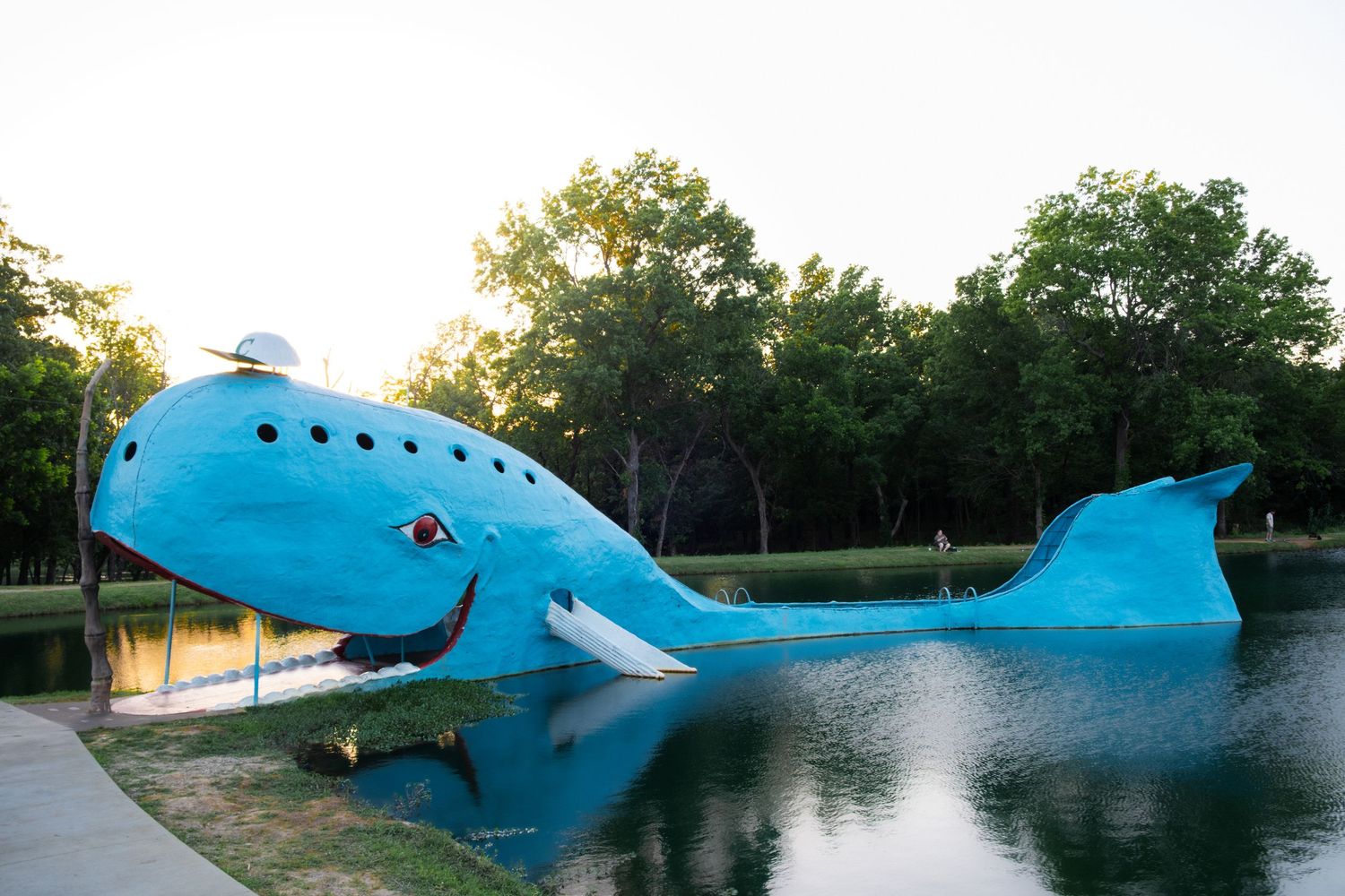 8. The Blue Whale of Catoosa in-full with anglers fishing the pond in the background. June 10, 2026.