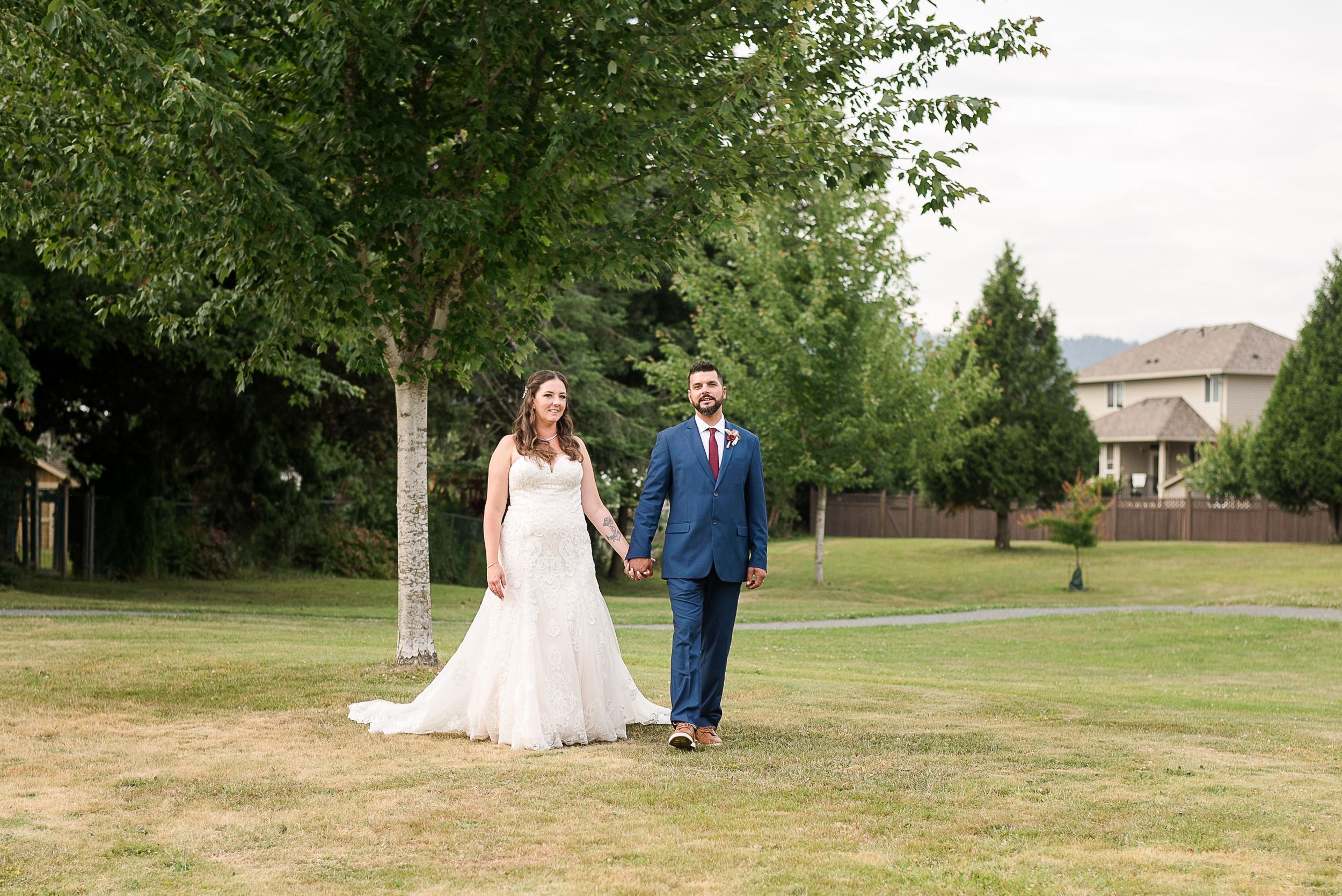 Bride and groom sharing a candid moment on their wedding day. Chilliwack, BC.
