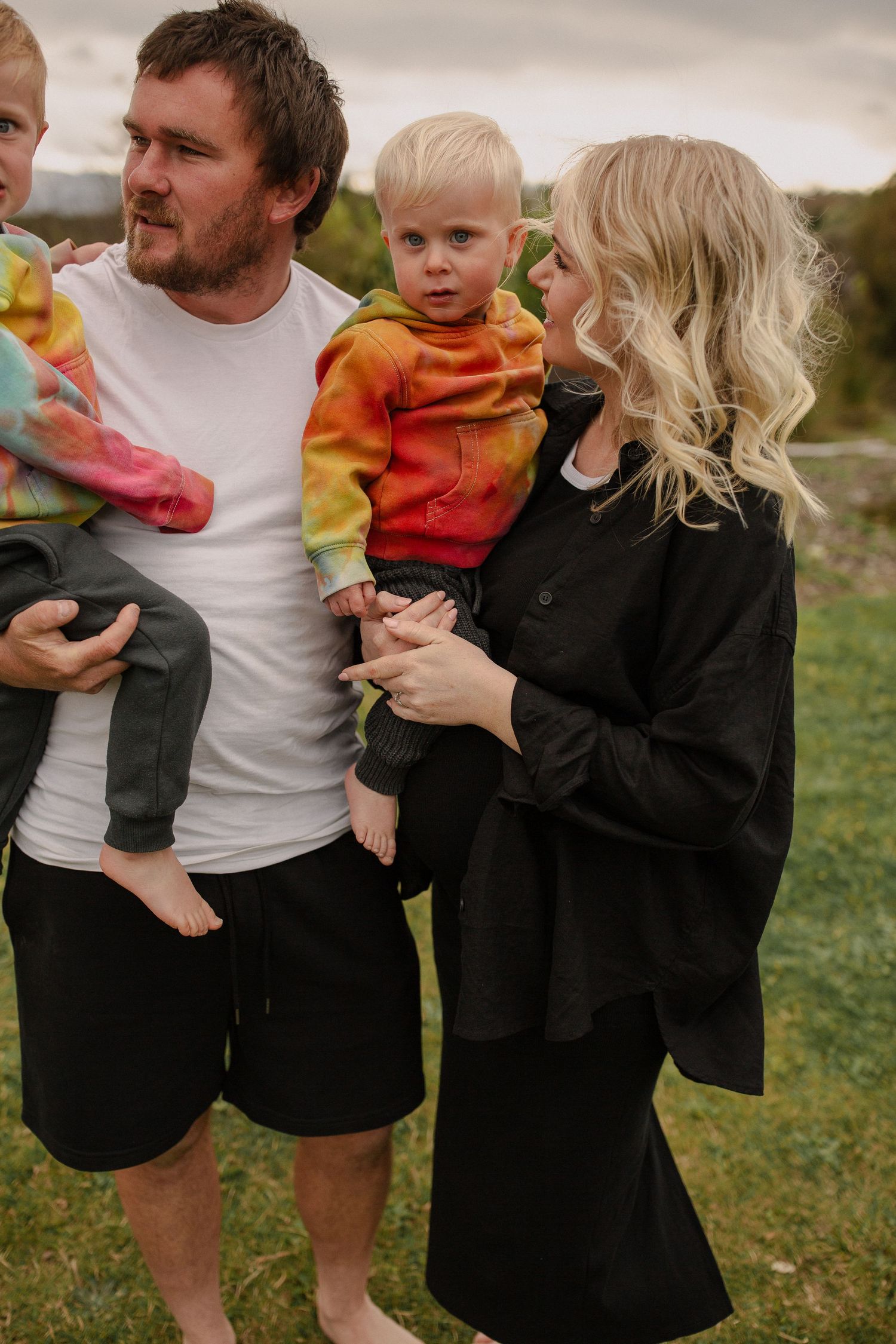 Family photo session, colourful, mum, dad and two little boys at Kina.