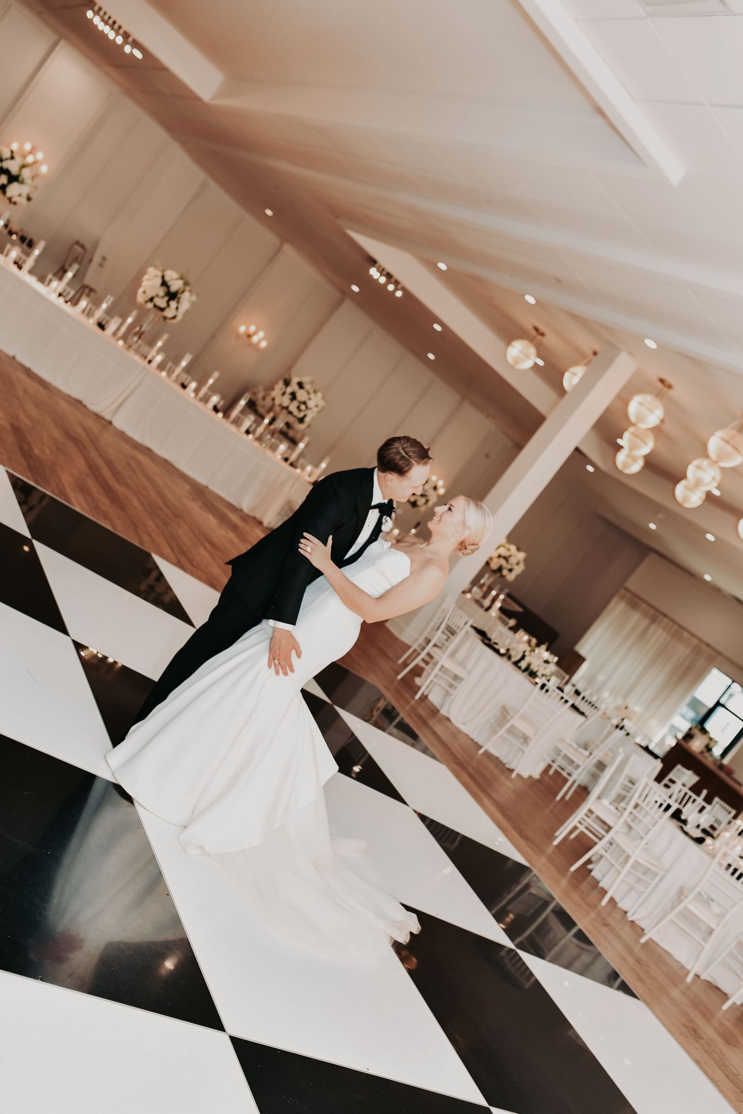 Nicole and Payton sharing a quiet moment before their reception begins