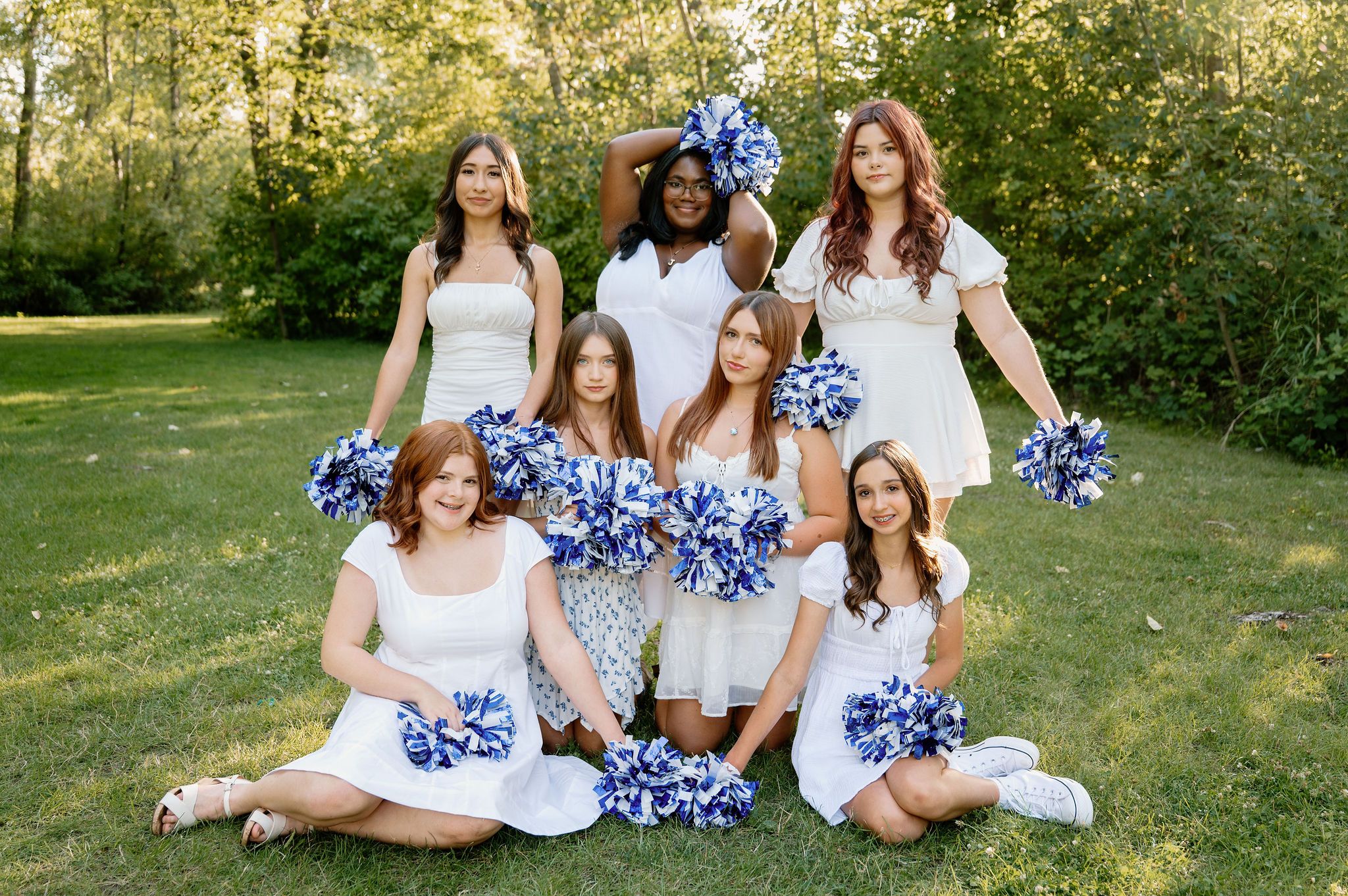 Walla Walla High School dance team photoshoot with blue and white pom poms and white dresses
