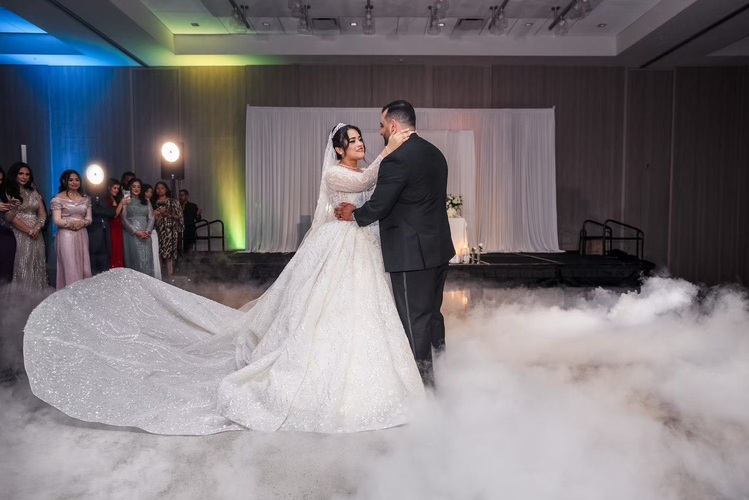 Bride and groom share first dance at renaissance wedding venue.