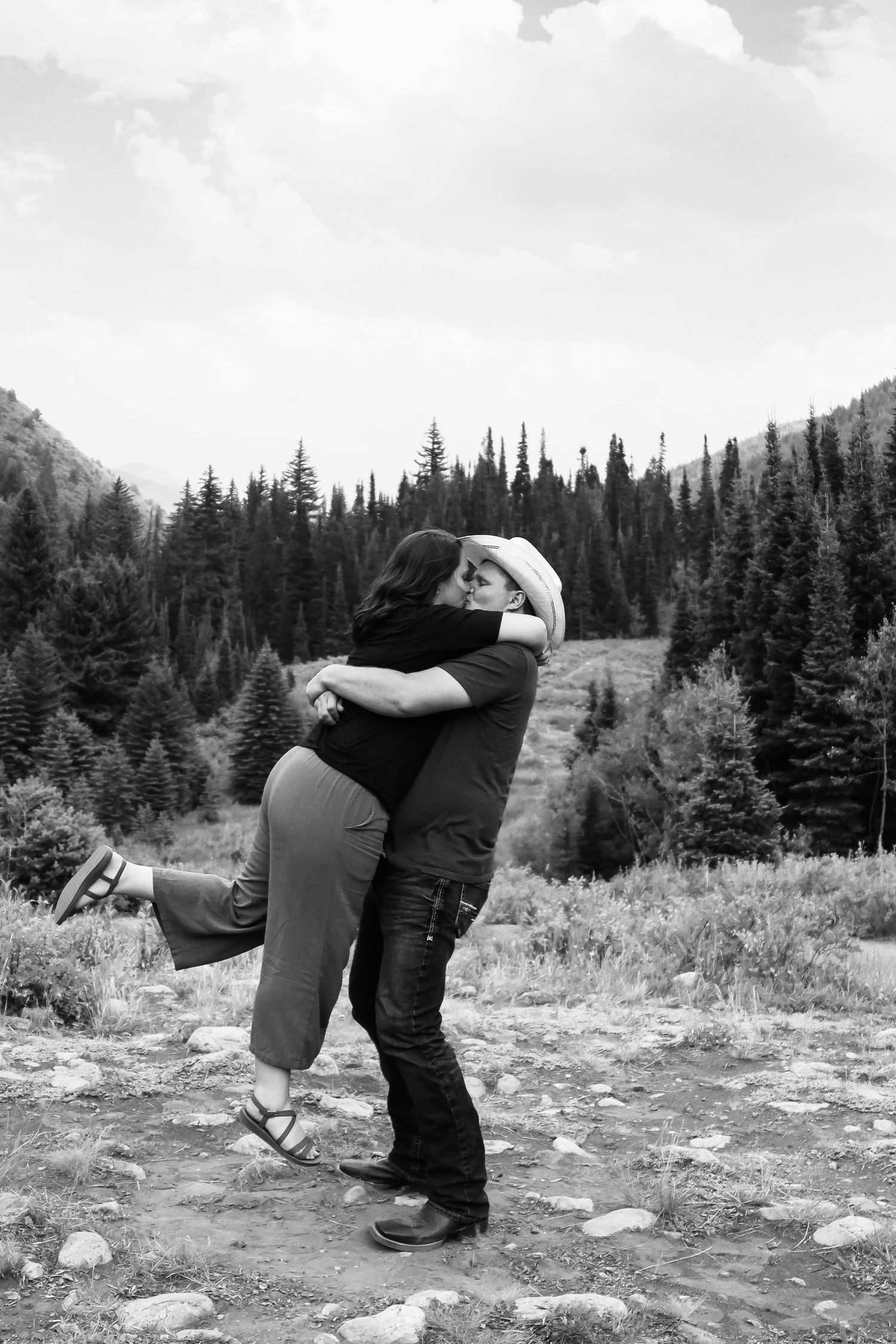 Couple embracing in Big Cottonwood Canyon, Utah