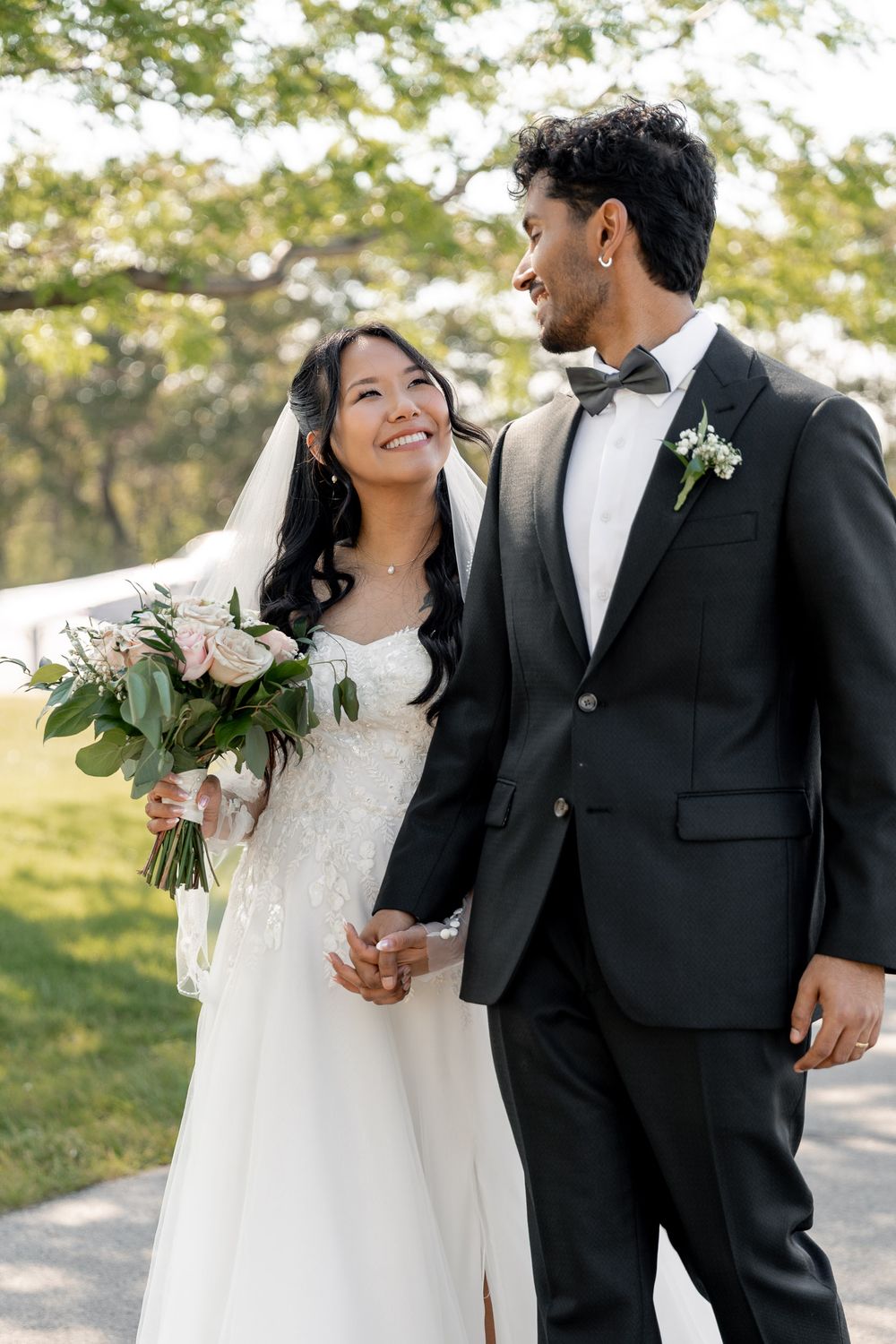 photojournalist and candid photo of the couple walking near the venue