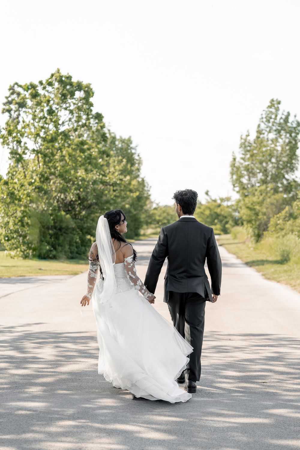 photography of the couple walking