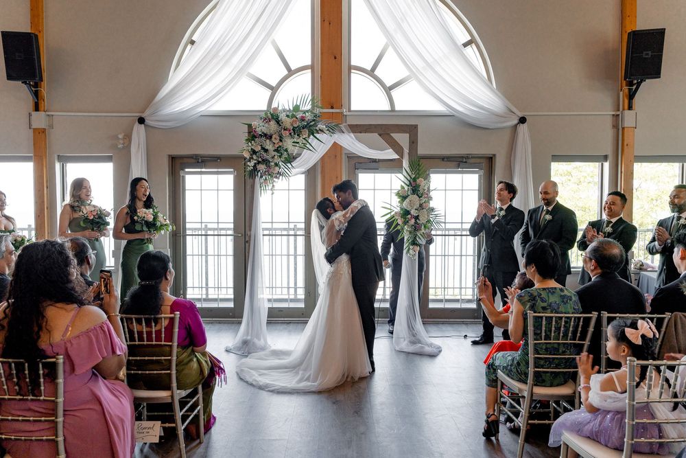 couple going for a kiss during ceremony