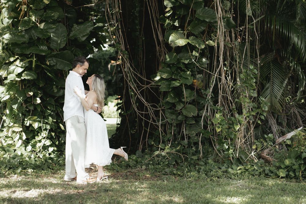 Newlywed engaged couple embracing after proposal in The Ancient Spanish Monastery, Miami Beach