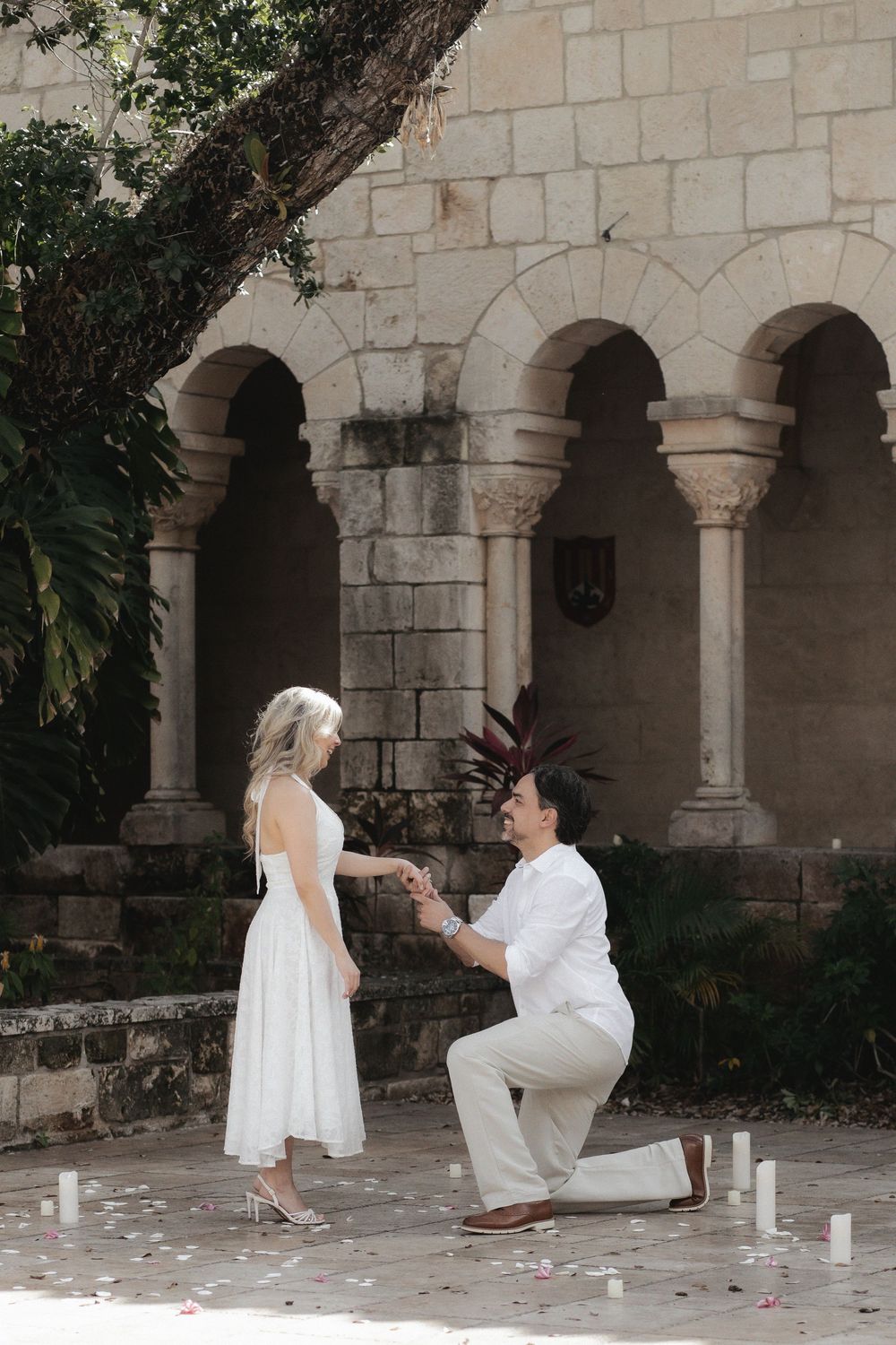 Couple in marriage proposal in The Ancient Spanish Monastery, Miami Beach