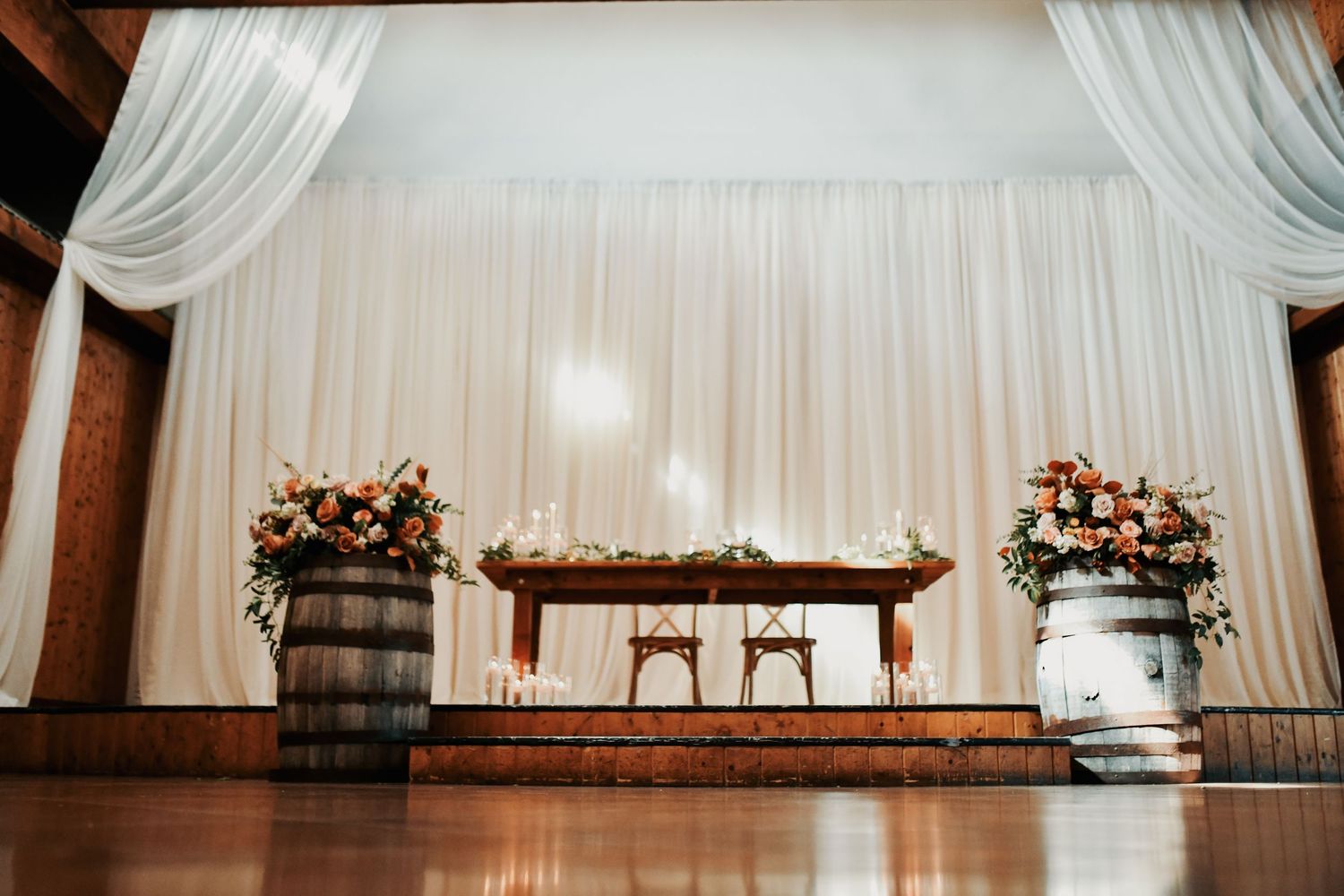 Beautifully decorated wedding reception tables at Lucky Spur Ranch