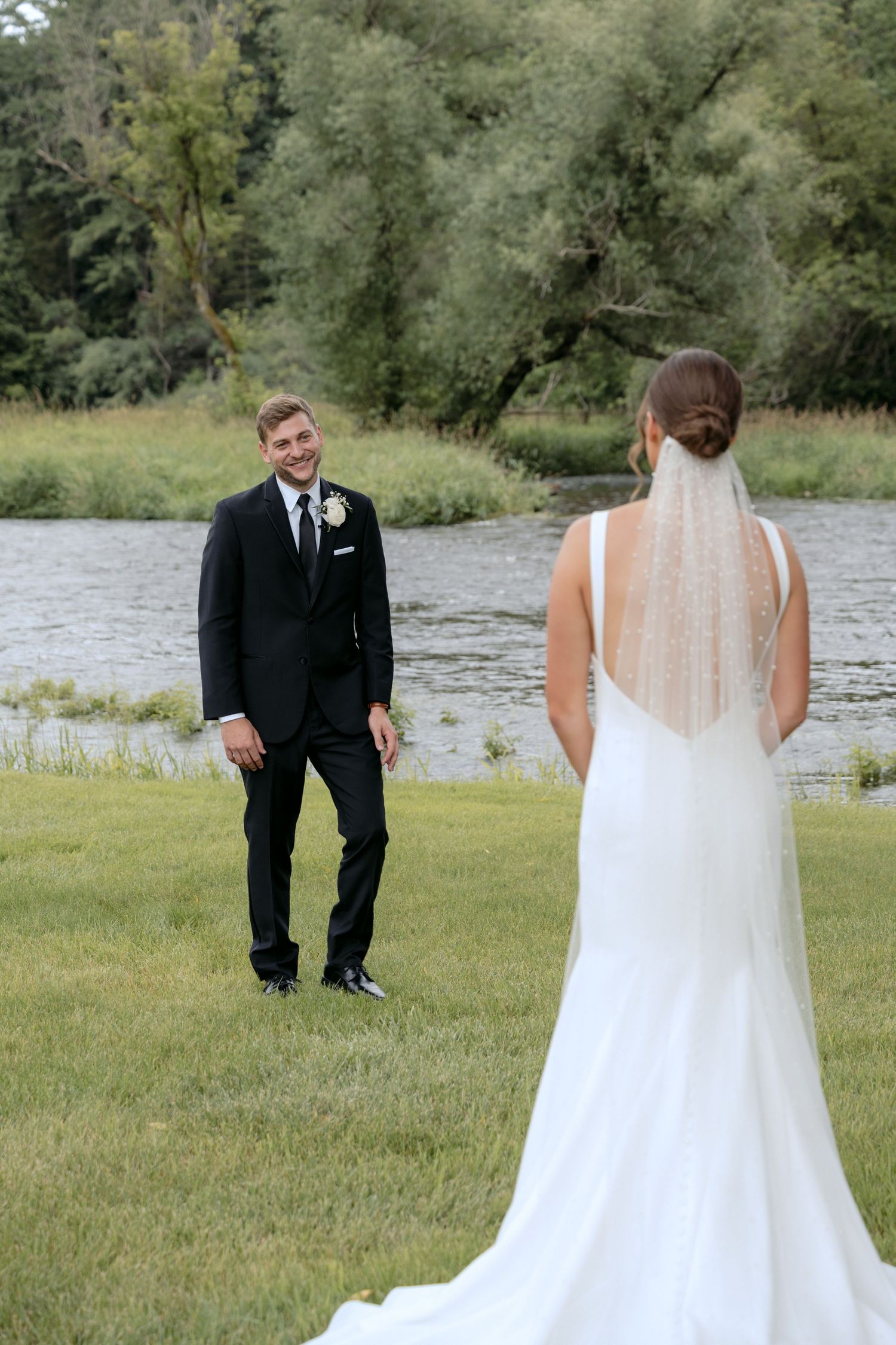 Bride & Groom have a moment of silence together after their first look at La Pointe Events in Somerset, WI.