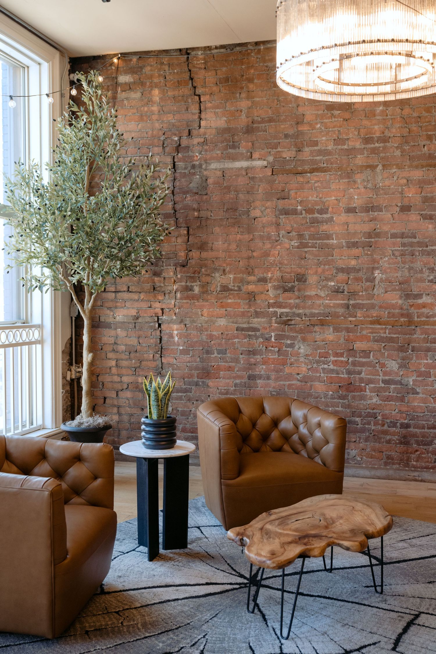 Cozy leather chair lounge space at Loft 214 in Stillwater MN.