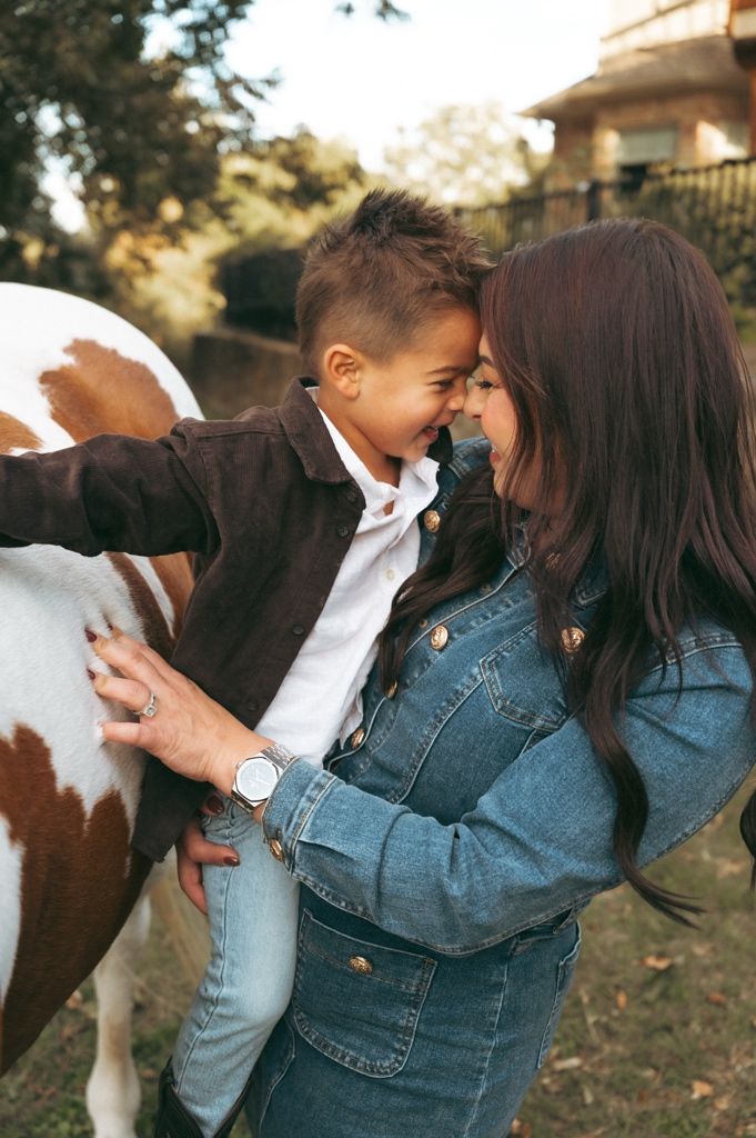 Mom and son having a special moment while petting a horse at Windmill Stables. Photo taken by Mary Hickman Photography.