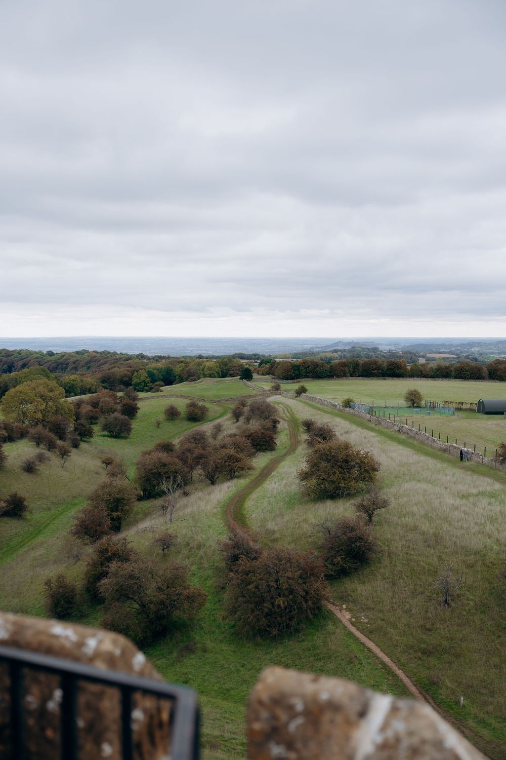 Romantic engagement moment at Broadway Tower.