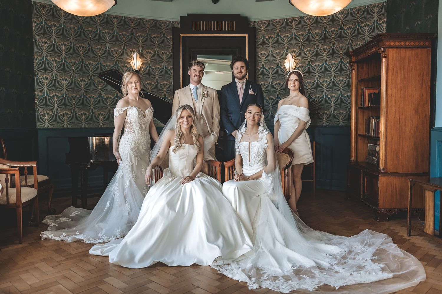 a group photo of the model brides and grooms at Charlotte House.
