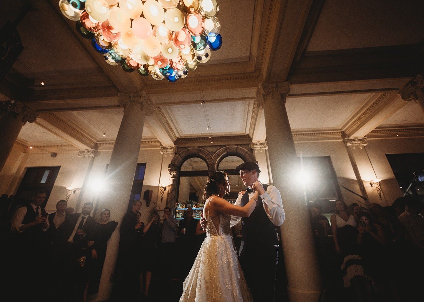 First dance under the chandelier at Teatro Calgary wedding reception