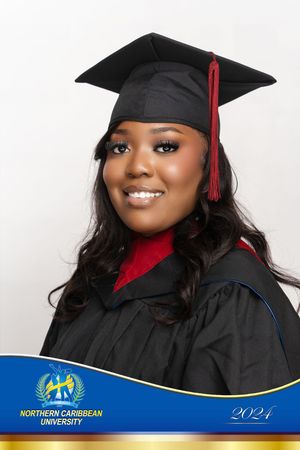 A graduation photo showing someone wearing a black cap and gown with red accents against a white background.