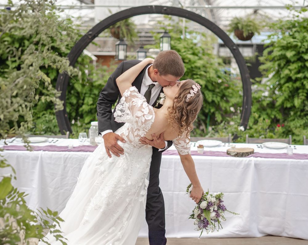 A dip kiss on a wedding day.