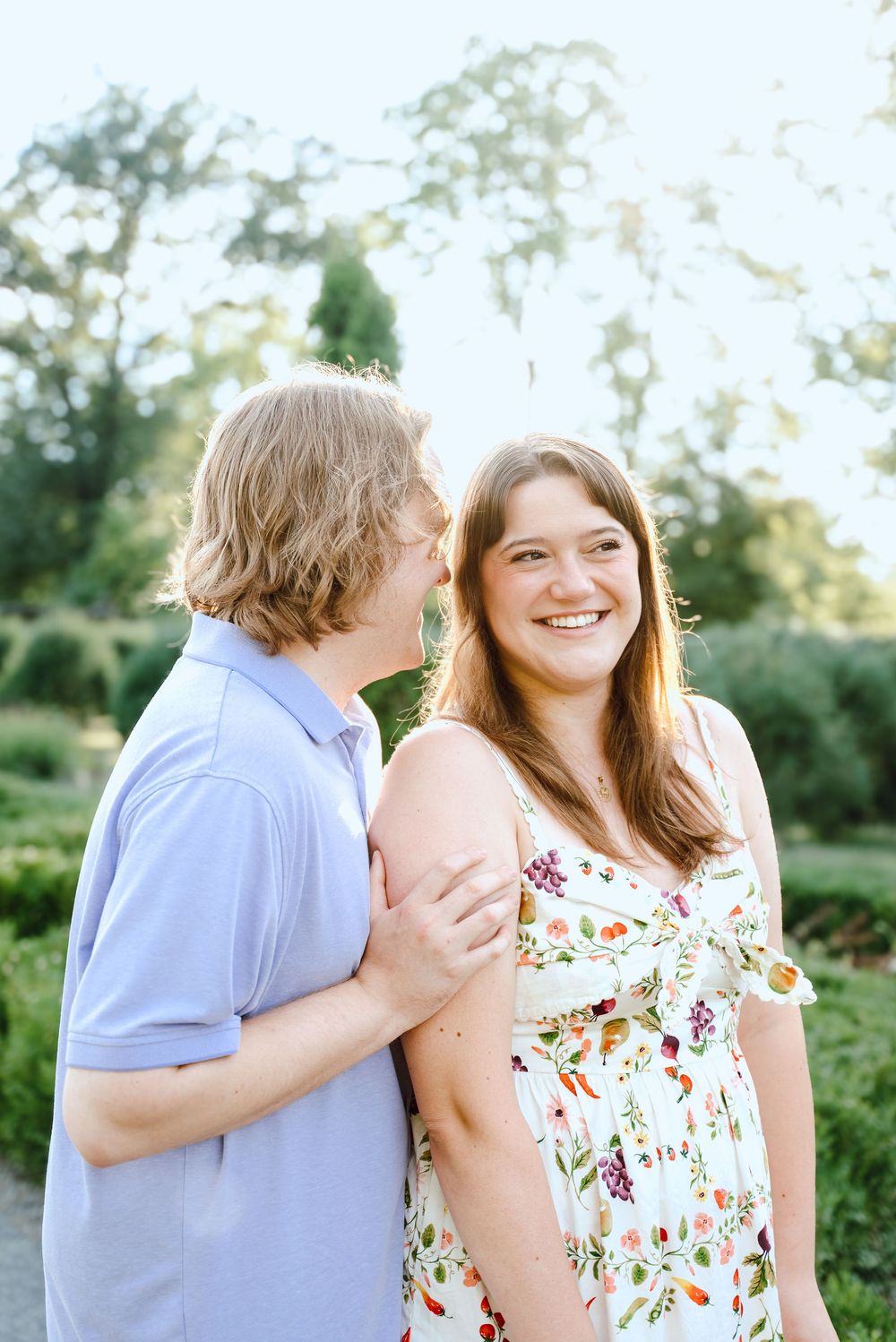 A couple shares tender moments outdoors in a series of three photos showing them smiling and embracing.