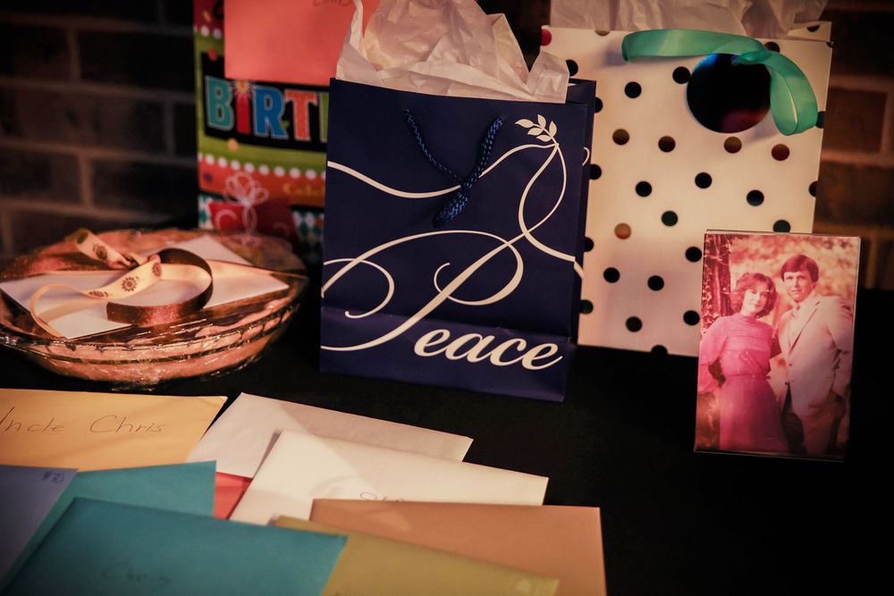 Gifts and a photo on a table.