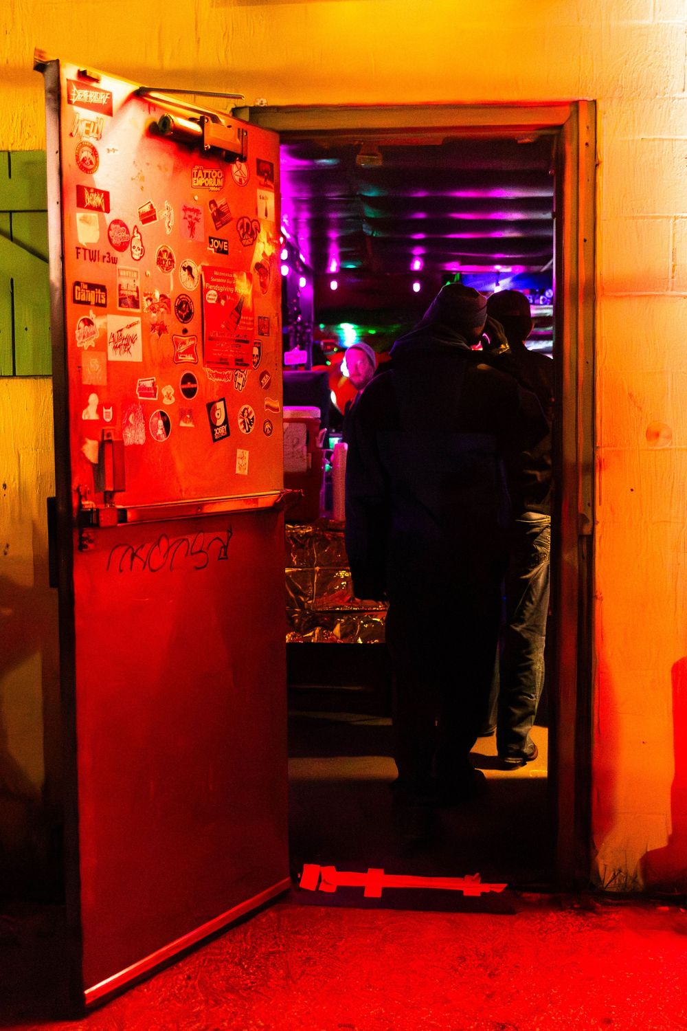 A photo of the entrance to a small dive bar.