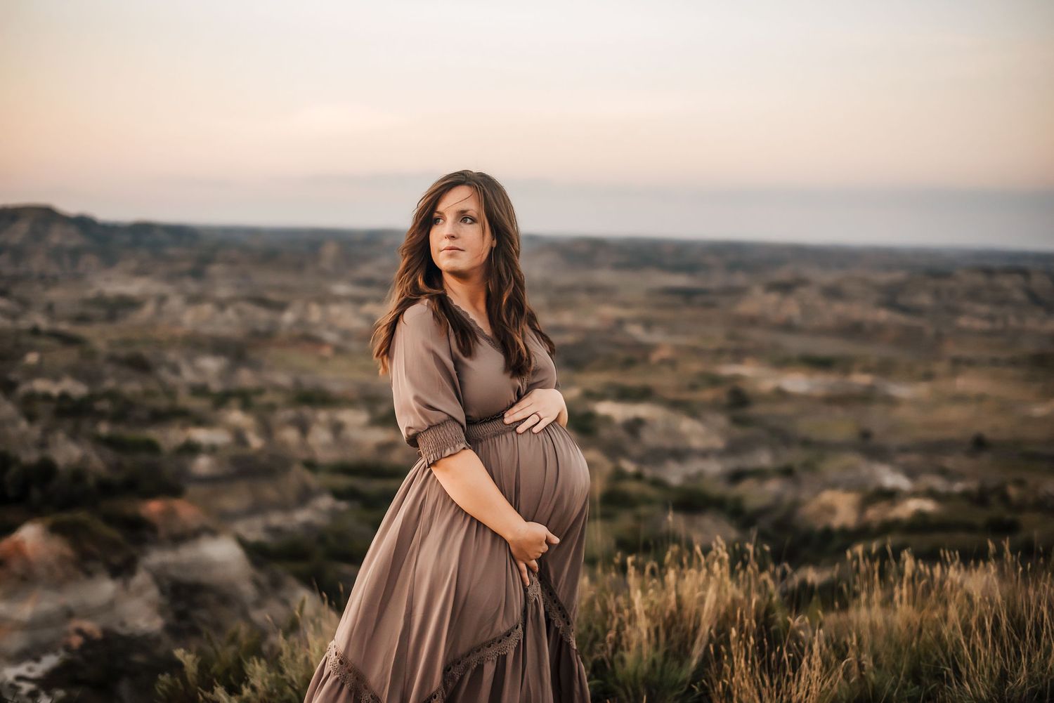Maternity session in the Badlands of Theodore Roosevelt National Park - family lifestyle photographer serving southwest North Dakota