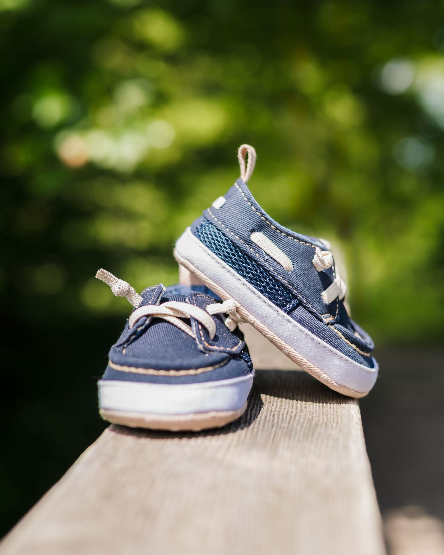 A pair of tiny blue boat shoes. Maternity announcement. Northern Virginia & DMV photographer