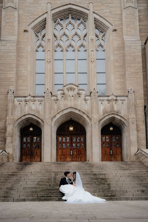 A wedding couple photographed in sequence against a grand Gothic church facade with stone arches.