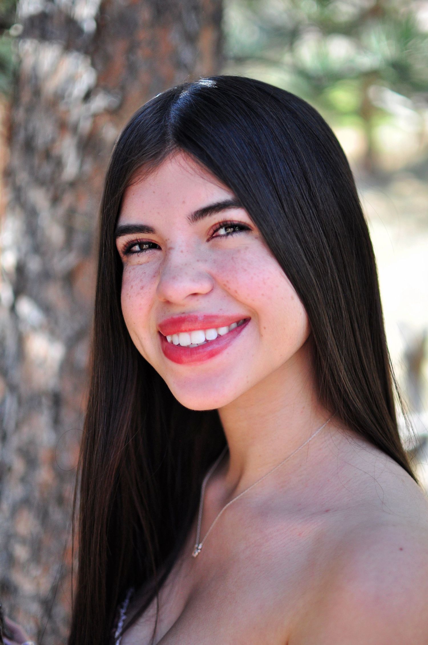 Headshot of a young black haired lady