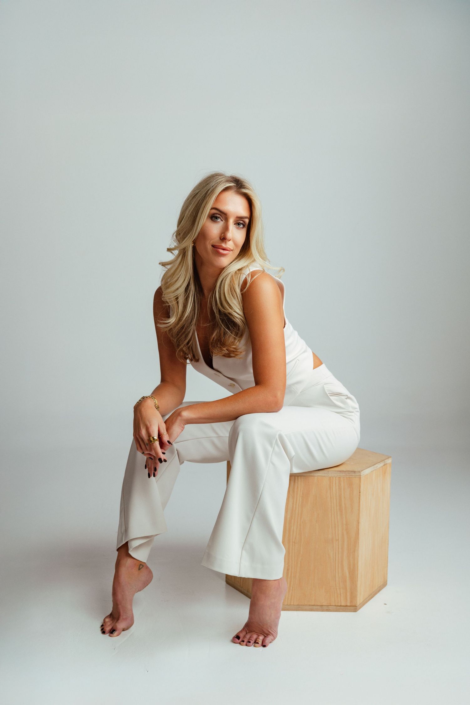 Polished studio portrait of a female designer created for executive branding, marketing, and professional visibility.