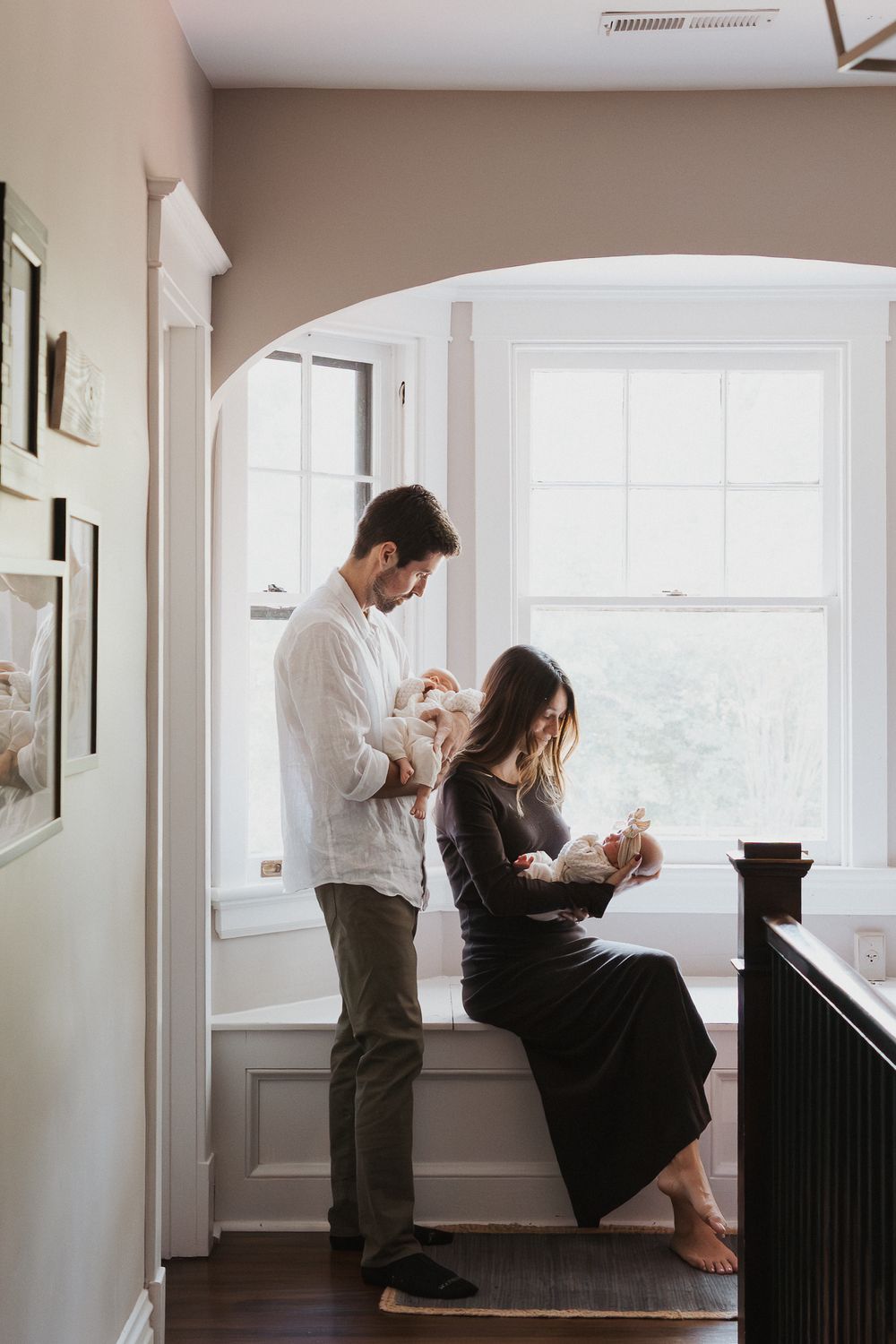 A couple shares a tender moment by a bright window in a minimalist interior setting, shown in multiple frames.