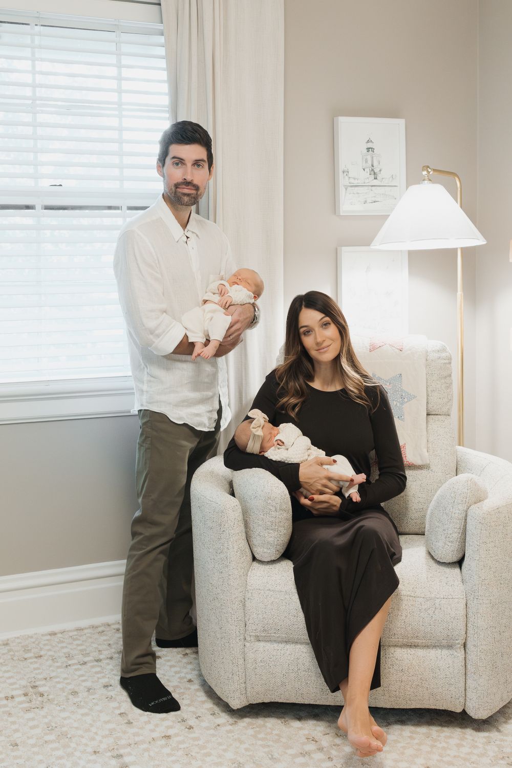 Four connected photos show a family sitting together in a light gray armchair in a bright, modern living room.