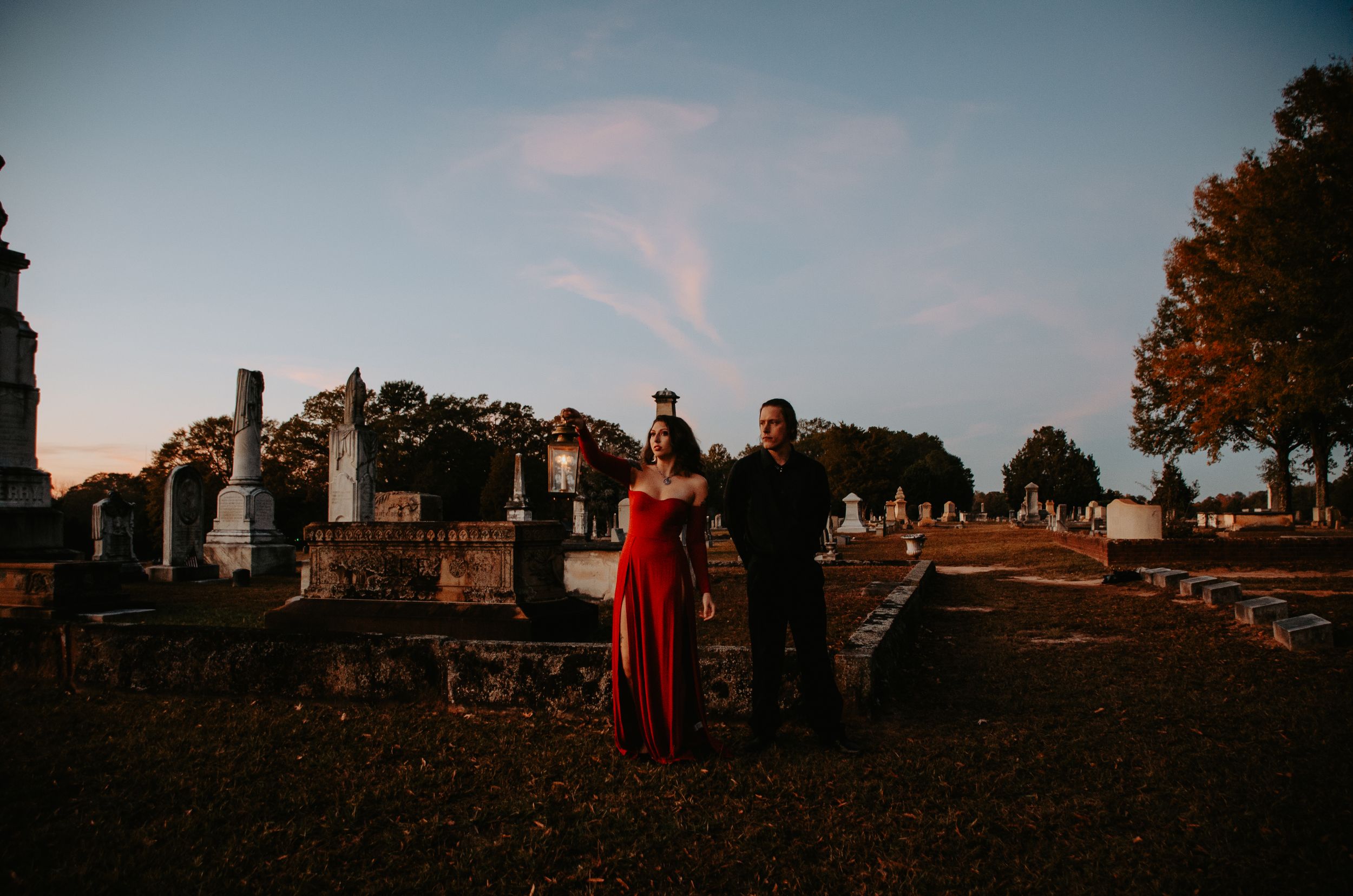 Loving couple sharing a tender moment, captured in a natural and romantic setting during a photo session