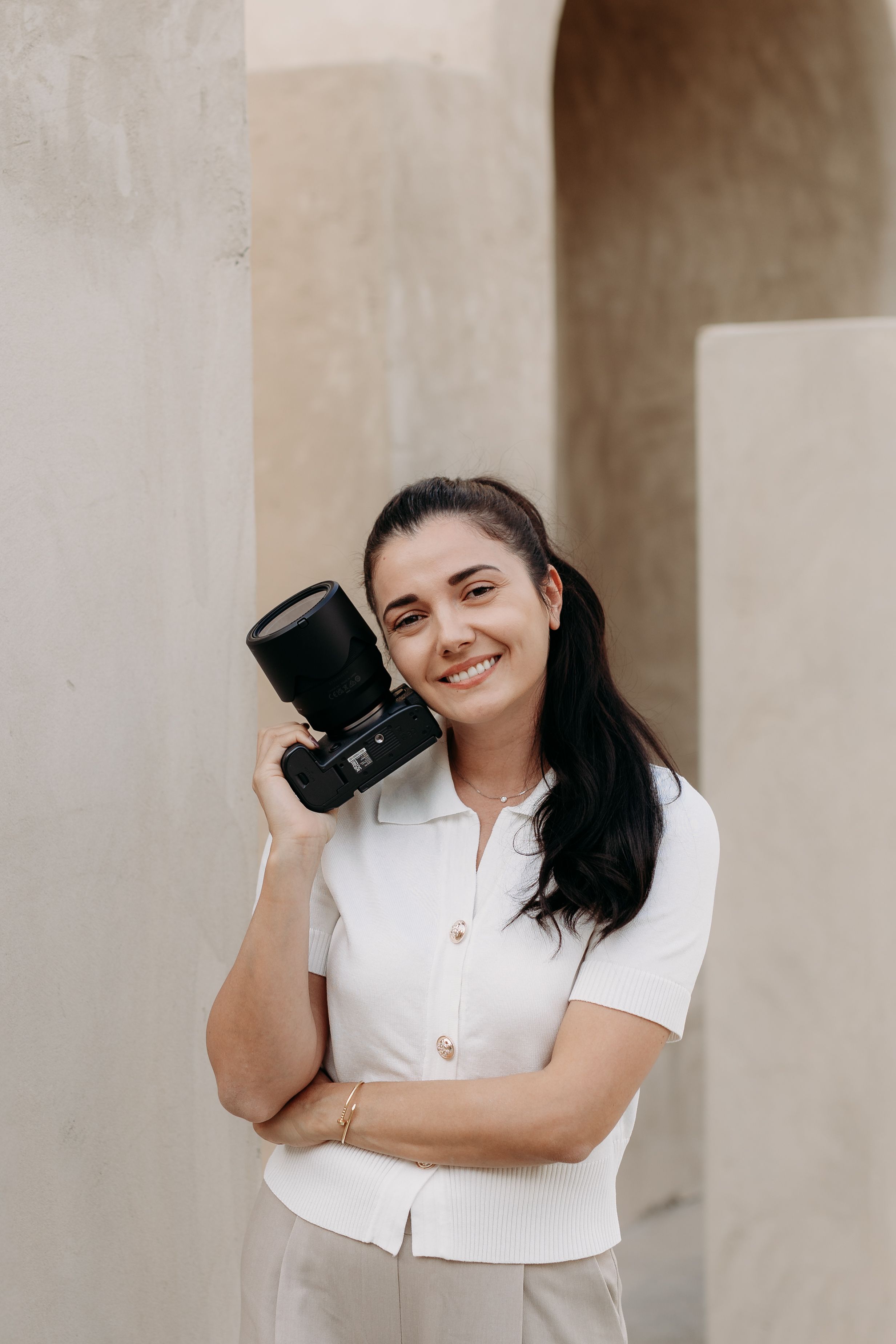 Dubai Family and Wedding Photographer with her camera