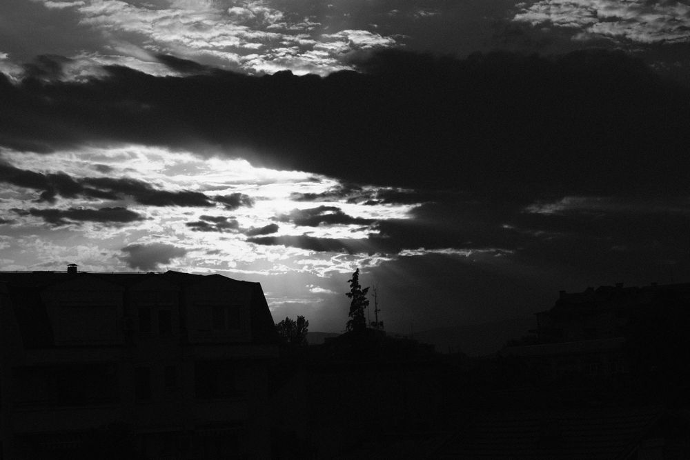 Silhouette of Skopje, North Macedonia during sunset.